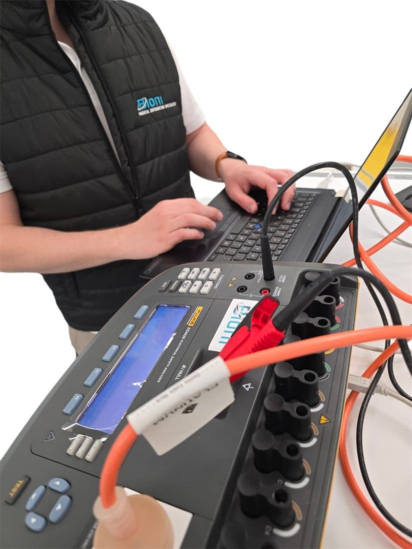 Multifunction installation tester in use during electrical compliance testing